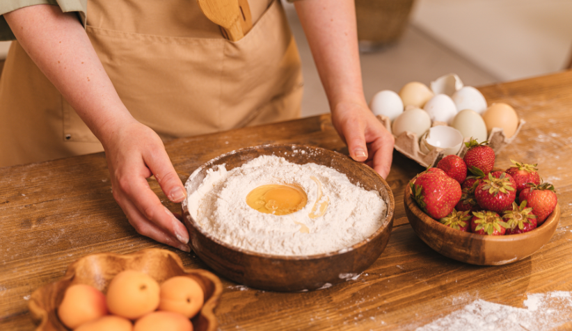 Formulator analyzing plant-based egg replacement systems with ingredients like mung bean protein, aquafaba and clean-label alternatives to improve egg functionality in bakery and food formulations.