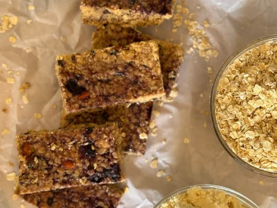 Plant-based baked goods and snacks made with OMN9 mung protein isolate, improving texture, shelf life, and protein content in granola bars, crackers, and snack applications